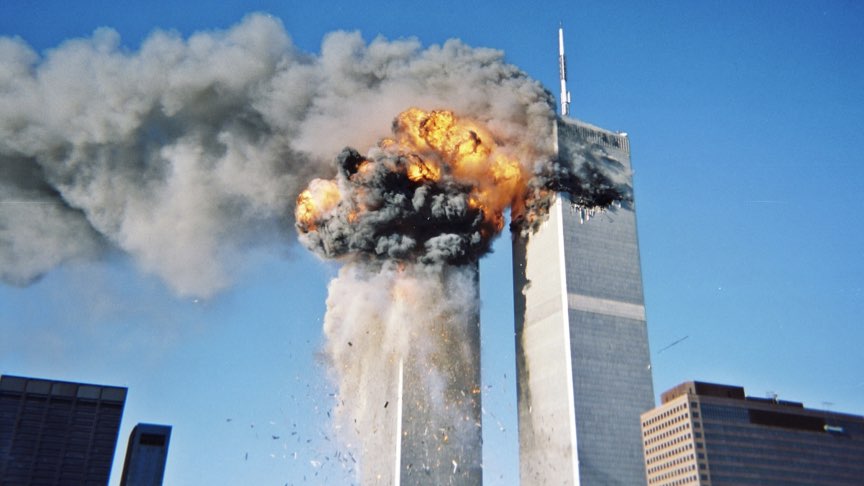 Image of the September 11, 2001 terrorist attacks on the United States, showing the destruction of the World Trade Center in New York City by al-Qaeda operatives.
